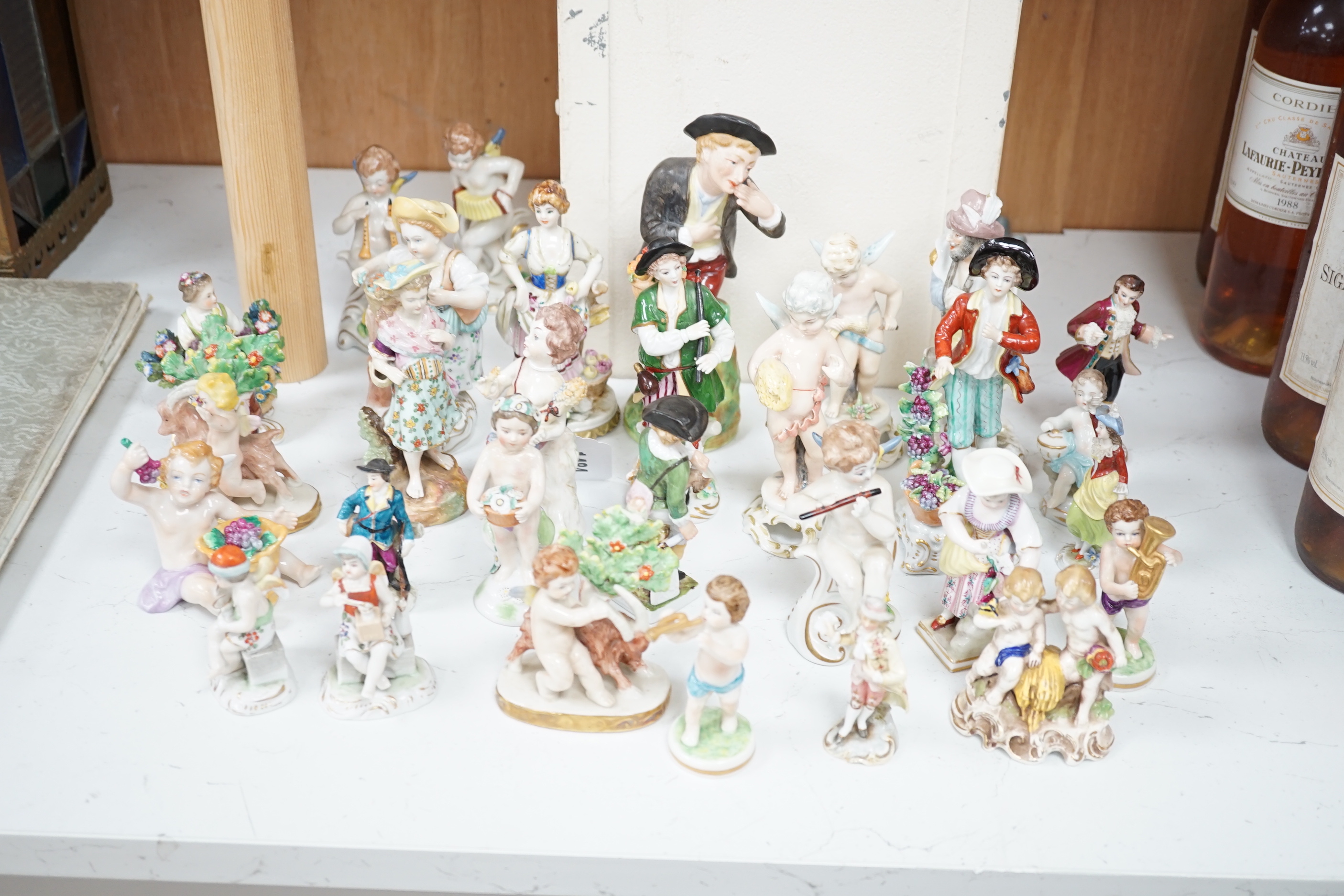 A group of 19th century and later porcelain figurines including Sitzendorf, 18cm high